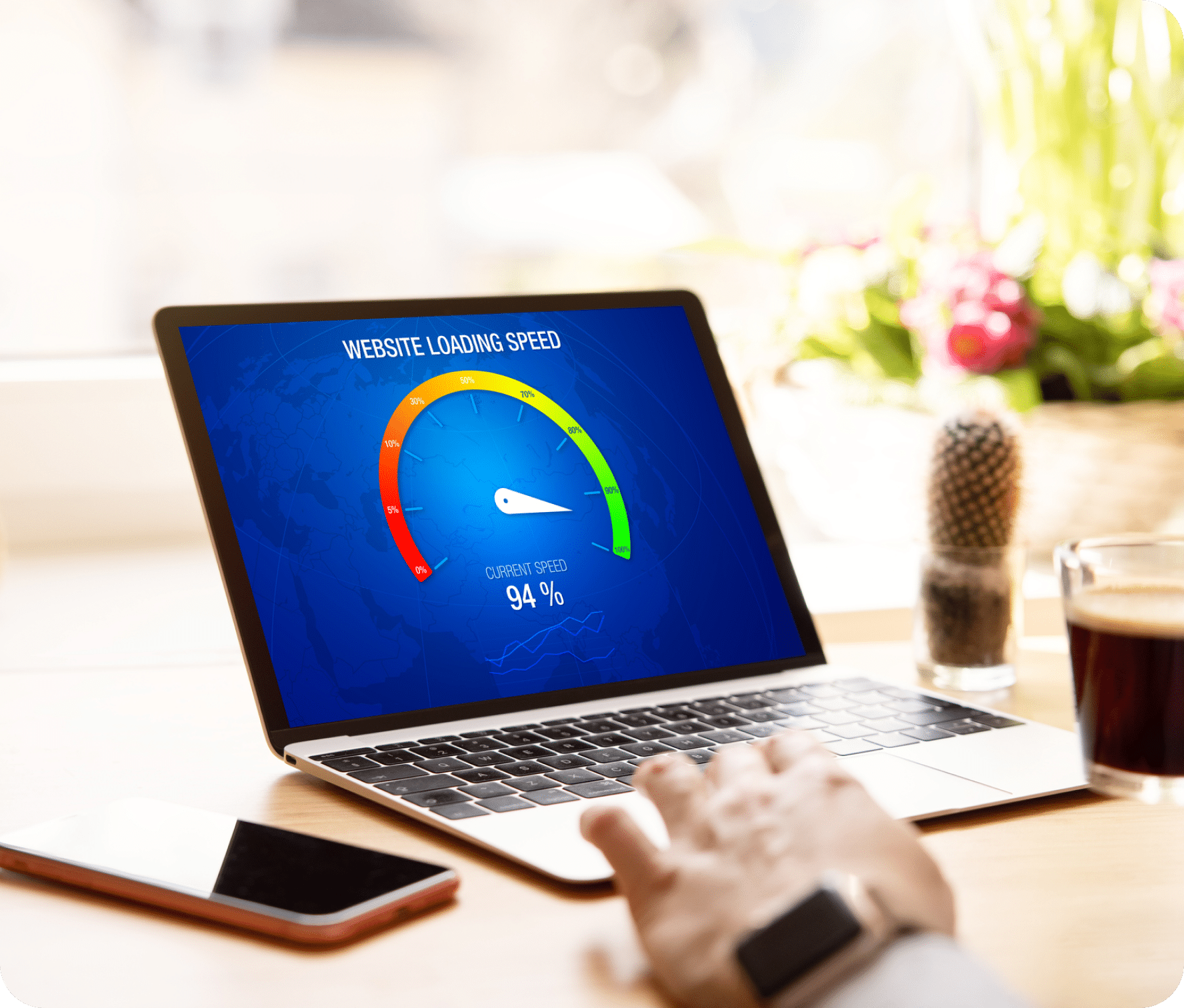 Website loading speed meter displayed on a laptop screen.