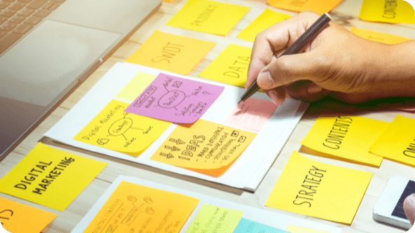 Blog content brainstorming through sticky notes.