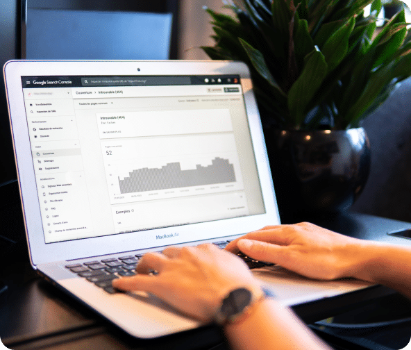 Search Console reports on laptop computer for user engagement.