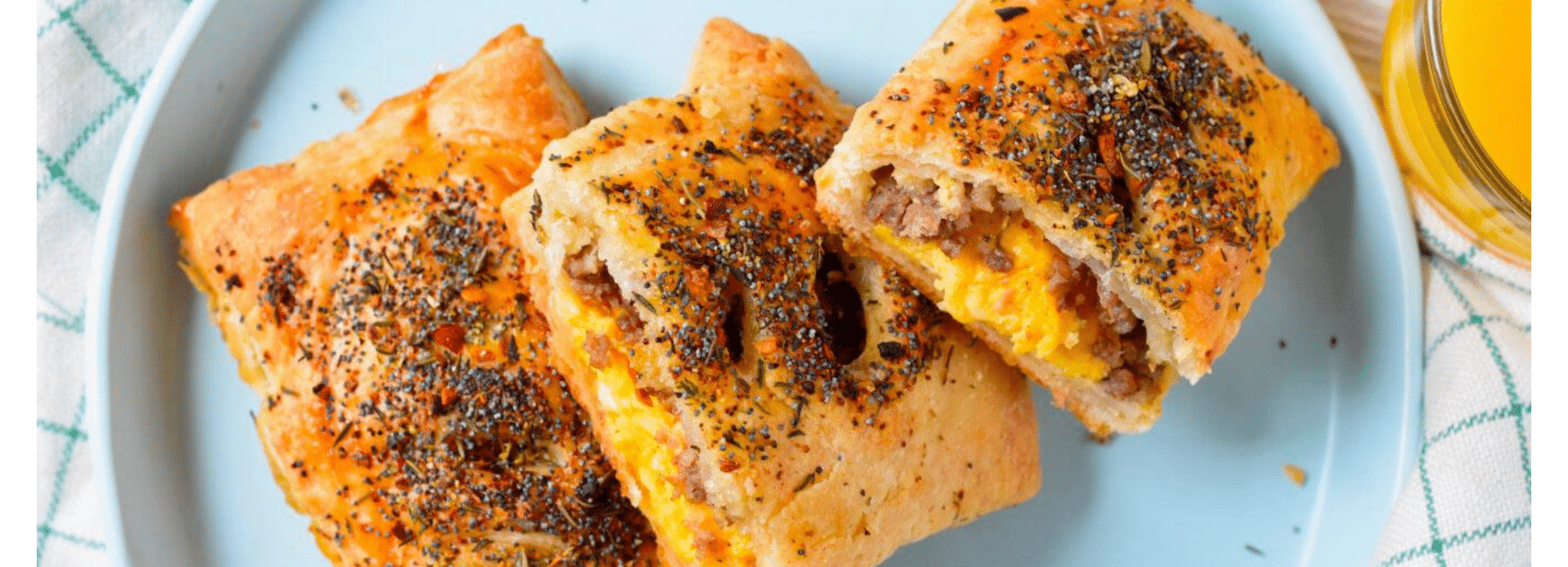 Swaggerty's Sausage sandwich pockets with ground sausage, cheese, and seasonings on top.