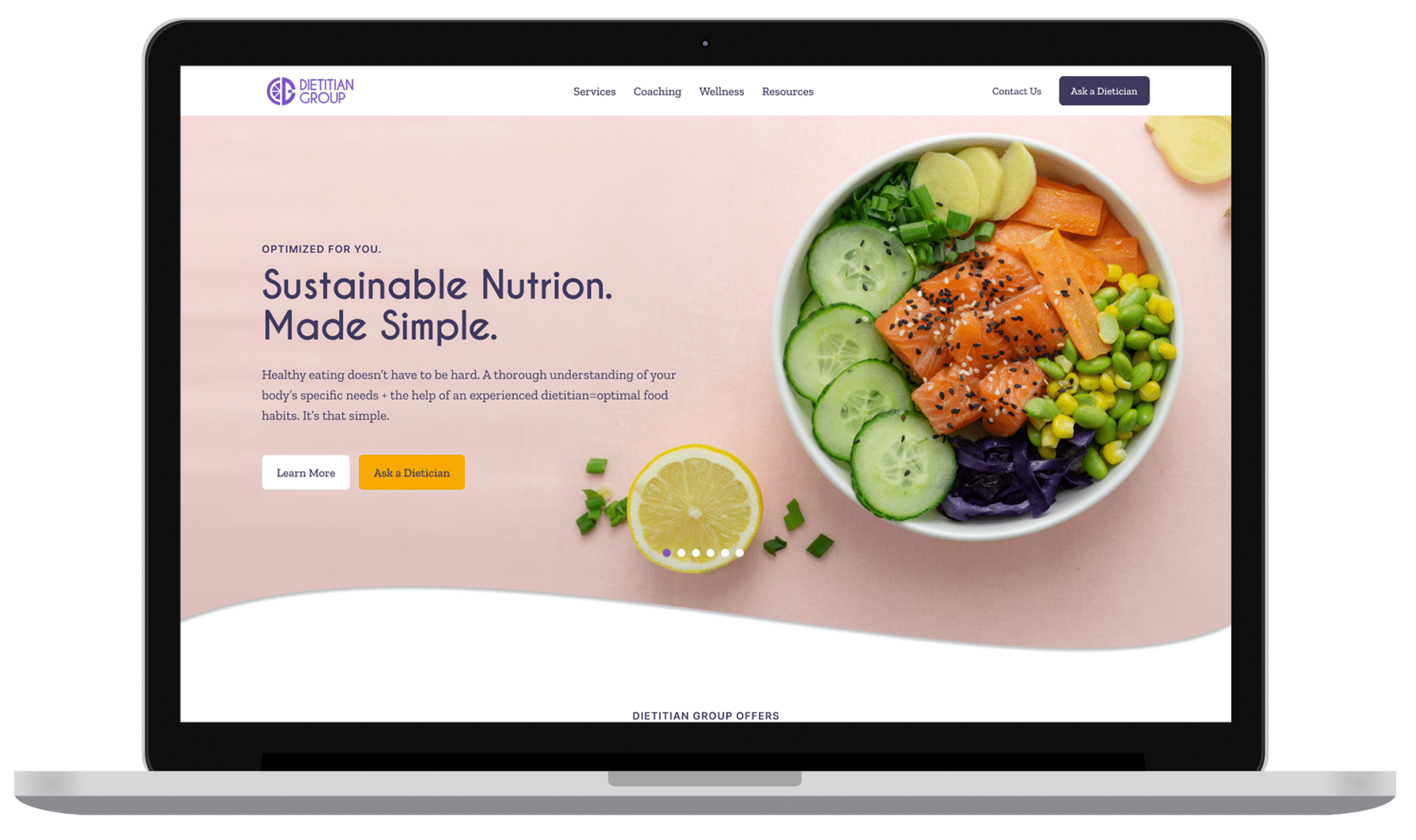 Homepage of the Dietitian Group website displayed on an open laptop.