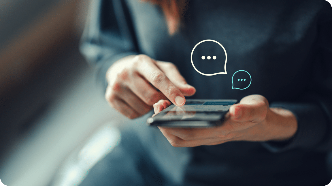 One hand holds a mobile phone while the other scrolls, chat bubbles float over it.